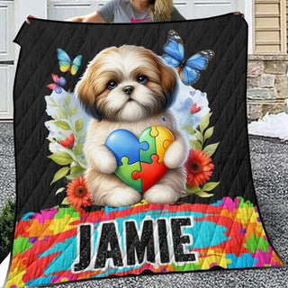 a woman holding a blanket with a dog on it