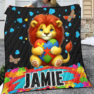 a woman holding a colorful lion themed blanket