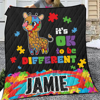 a woman holding a quilt with a giraffe on it