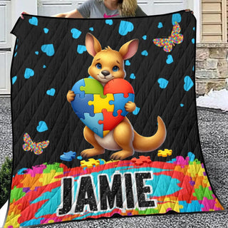 a woman holding a colorful puzzle piece with a kangaroo on it