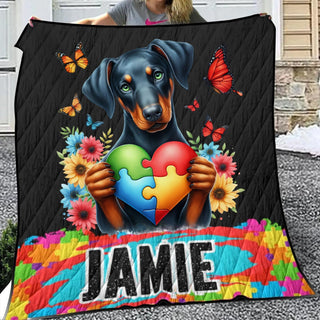 a woman holding a black and brown dog holding a heart shaped puzzle