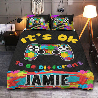 a bed with a video game controller on it