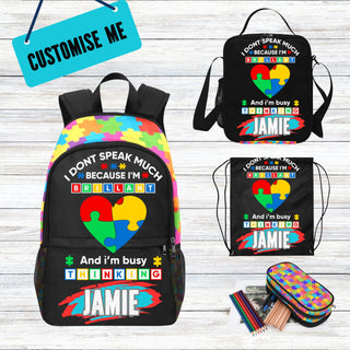 a colorful backpack with a name tag on it