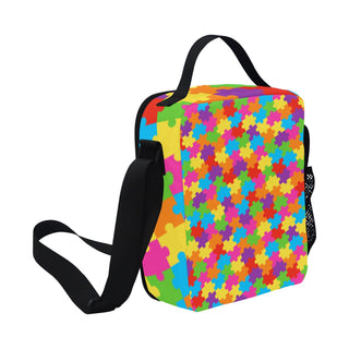 a multicolored bag with a black strap