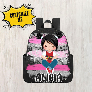 a backpack with a picture of a girl sitting on the floor