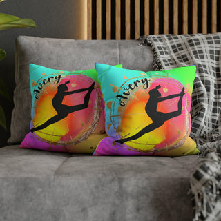 two pillows on a couch with a picture of a person on a surfboard