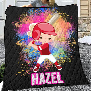 a girl holding a blanket with a picture of a baseball player