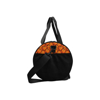 a black bag with orange pumpkins on it