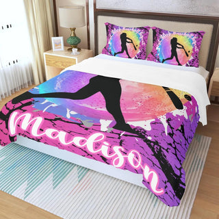 a bed with a colorful bed spread and pillows