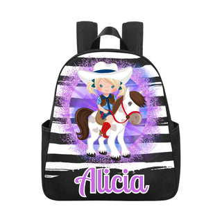 a backpack with a picture of a girl riding a horse