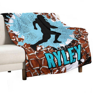 a throw blanket with a football player on it