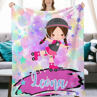 a girl is holding up a personalized blanket