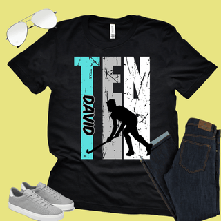 a t - shirt with a picture of a hockey player on it