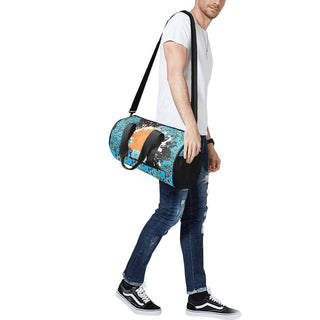 a man carrying a duffel bag with a skateboard design on it