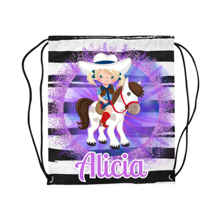 a drawsack bag with a picture of a girl riding a horse