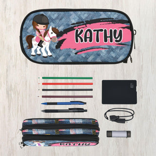 a pencil case with a horse and rider on it