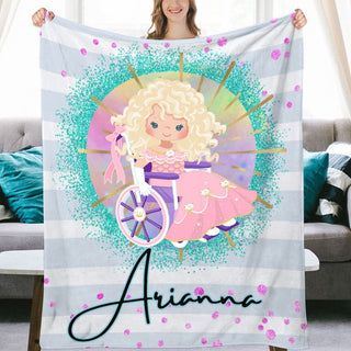 a woman holding up a personalized blanket