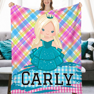 a woman holding a blanket with a picture of a princess on it