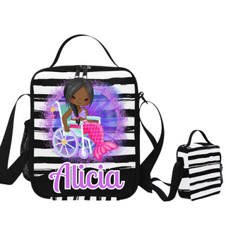 a black and white striped bag with a picture of a girl on it