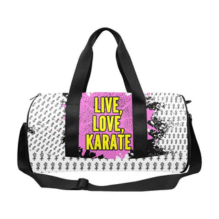 a white and pink duffel bag with the words live love karate on it