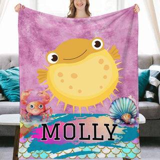 a woman is holding a personalized beach towel