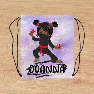 a drawstring bag with a picture of a girl on it