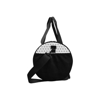 a black and white handbag with a black strap