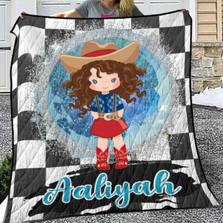 a girl wearing a cowboy hat holding a quilt