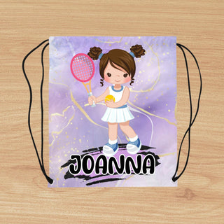 a drawstring bag with a girl holding a tennis racket