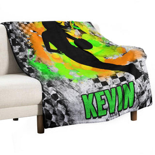 a couch with a blanket on top of it