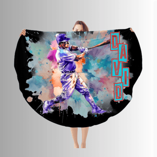 a woman is holding up a blanket with a picture of a baseball player