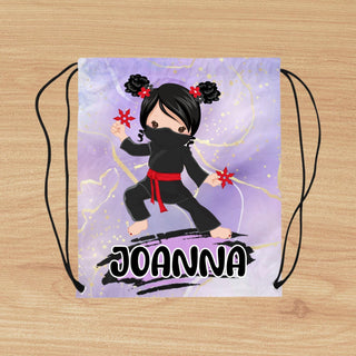 a drawstring bag with a picture of a girl on it