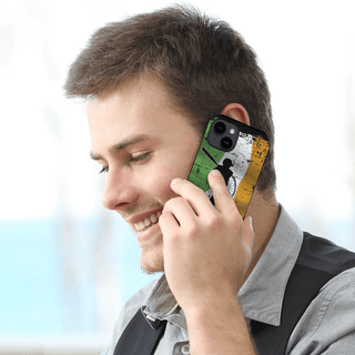 a man holding a cell phone to his ear