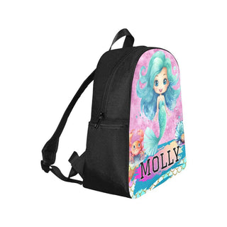 a little girl's backpack with a picture of a mermaid on it