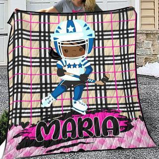 a woman holding a blanket with a picture of a football player on it