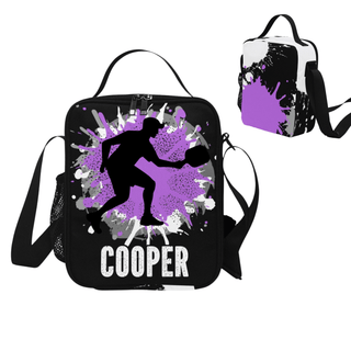 a purple and black bag with a picture of a man holding a basketball