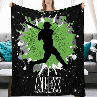 a woman holding a blanket with a baseball player on it