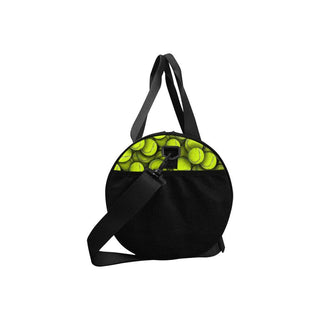 a black bag with yellow tennis balls in it