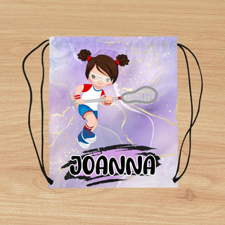 a drawstring bag with a picture of a girl holding a tennis racket