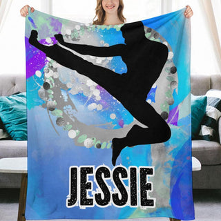 a woman holding up a personalized beach towel