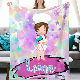 a girl holding up a personalized fleece blanket