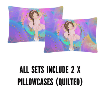 two pillows with a picture of a ballerina on them