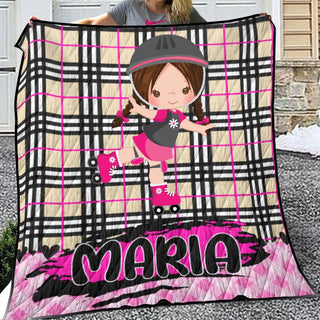 a woman holding a blanket with a picture of a girl on it