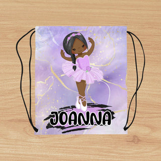 a drawstring bag with a picture of a little girl in a ballet outfit