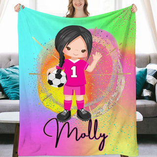 a girl holding a soccer ball in front of a colorful background