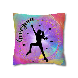 a colorful pillow with a silhouette of a girl on it