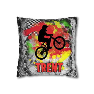 a pillow with a man riding a bike on it